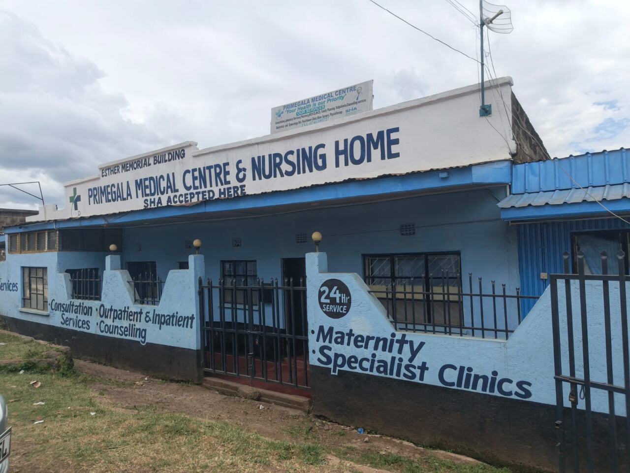 The Primegala Medical Centre & Nursing Home building at Maili Sita: a white and blue building with the sign 'SHA accepted here' and '24 hr service'